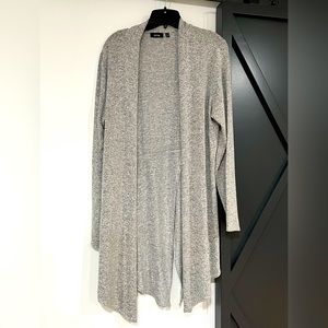 Gray & black cardigan with back slit .  Size large
